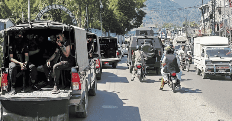 Security forces patrol a street in Rawalakot during the Pakistan-Occupied Kashmir protest movement in June 2026 following the ban on the Jammu Kashmir Joint Awami Action Committee (JAAC).